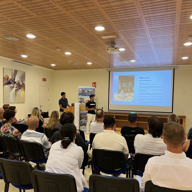 Federico speaking at an AI event to a room of founders